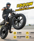 Rider performing a wheelie on Beast Mode Fat Tire Electric Bike With 1500W Peak Power, showing 28 MPH top speed capability.