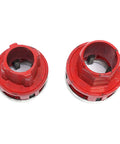 Two red dies from Pro Grade 7 Piece Pipe Threading Kit With Tap And Die Set Including 3/8, 1/2, 3/4, 1, 1-1/4, 1-1/2 And 2 Inch Dies.