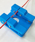 Super Cool Qinkyh Welding Wire Fixture And Soldering Table Clamp with blue clamp holding red wire securely for soldering.