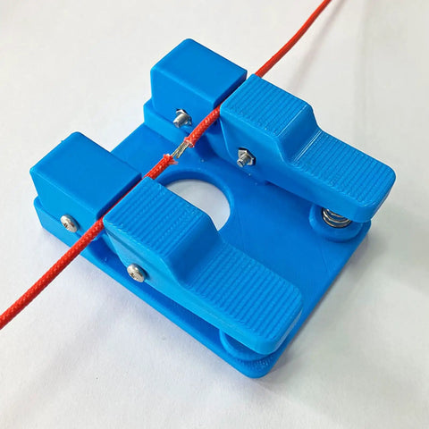 Super Cool Qinkyh Welding Wire Fixture And Soldering Table Clamp with blue clamp holding red wire securely for soldering.