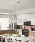 Crystal Chandelier Four Light Linear Raindrop Pendant Ceiling Light With Nickel Finish Ideal For Bedroom Dining Room Bar Or Kitchen Island Includes 59 Inch Rod And E12 Base Bulbs Not Included in modern kitchen environment