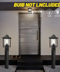 Boss Black Outdoor Post Light With Clear Glass Shade illuminating a modern entryway, weatherproof exterior lantern fixture shown