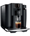 NoDrama Automatic Coffee Machine With OneTouch Espresso Brewing Milk Froth And Rapid SelfClean Design Programmable Strength Volume Controls For Smooth Daily Grinds In Piano Black with espresso shot in glass.