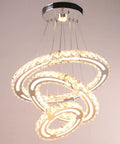 Lit Modern Crystal Chandelier DIY 3 Ring Dimmable Pendant Light With Remote LED Ceiling Fixture glowing in three ring design.