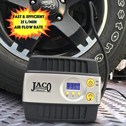 Slick And Dead Simple 12 Volt Portable Tire Inflator With Auto Shut Off And High Precision Digital Gauge next to a car tire.