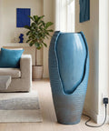 32 Inch Outdoor Jar Water Fountain With LED Lights, Vintage Blue Cracked Jar Design, Cascading Waterfall in living room.