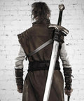 Back view of person wearing Medieval Sword Back Holster Leather Shoulder Frog Belt For Knight Cosplay Adjustable Universal Fit