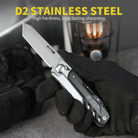 Gloved hand holding 7 In 1 Detachable Multitool with D2 Steel Blade and Large Scissors, showcasing its robust build.