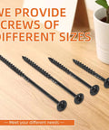 Heavy Duty Wood Structural Screws With Washer Head 6 Inch And 14 Gauge Star Drive Torx Bits Included Black Oxide Coated screws on a wooden table.