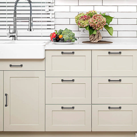 Solid 5 Inch Square Arch Cabinet Pulls Matte Black 30 Pack installed on white kitchen drawers