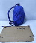 Side view of the Lightweight Daypack For Hiking And Camping In Bold Blue 11 By 9 By 10 Inches Trail Ready on white surface