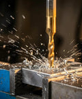 Six Piece Metric Drill And Tap Set M3 To M10 With Titanium Coated Carbon Steel Bits in use, drilling into metal