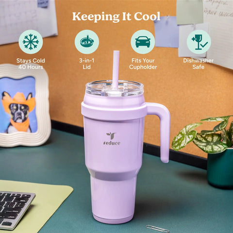 Chill Out With This Wicked 40 Oz Stainless Steel Tumbler Features A Sturdy Handle And Elite Dual Wall Insulation on a desk.