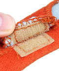 Close-up of velcro on Two Pack Hard Hat Sweatband With Air Cushioned Comfort Washable Orange Sweat Band Fits Most Helmets.