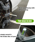 Universal Magnetic Camber Gauge For Dead Center Alignment And Sick Ride Stance Featuring Ballistic Magnet Grip on cast hubs used on car wheel and brake disc.