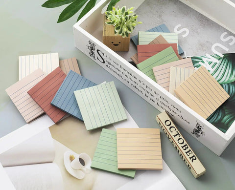 16 Pack Lined Sticky Notes 3 By 3 Inches Ruled Memo Pads With Super Sticky Power In Vintage Colors scattered on a desk