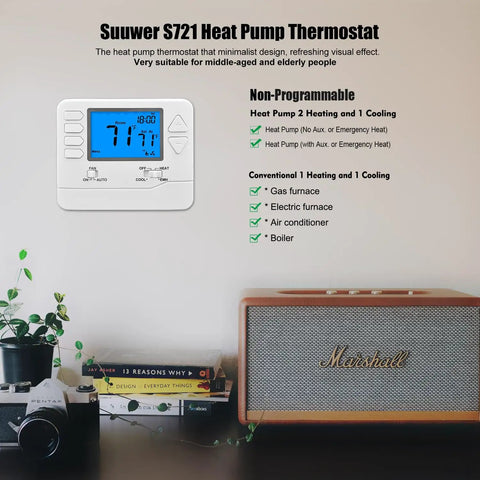 Non-Programmable Heat Pump Thermostat For Home Use Up To 2 Heat And 1 Cool on wall with plant and speaker.