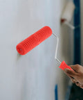 Kick Some Serious Flair Into Your Walls Using This Heavy Duty Ceiling Texture Roller With A Sturdy Plastic Handle To Nail That Perfect Straight Grain Pattern On Drywall Today in use on a wall.