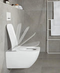 Solid Setup Rectangular Toilet Seat With Slick Soft Close Hinges And Easy Care Duroplast Frame Original Quality Bathroom Essentials Heavy Duty Replacement Lid Stone White in a modern bathroom setting.