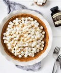 Pumpkin pie topped with marshmallows, Madagascar Bourbon Pure Vanilla Bean Paste For Baking And Cooking, 1 Gallon nearby