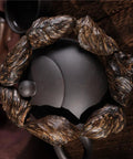 Vietnam Nha Trang Agarwood Unisex Jewelry Burl Scarred Black Oil Aged Bracelet with Adjustable Elastic Band on dark surface