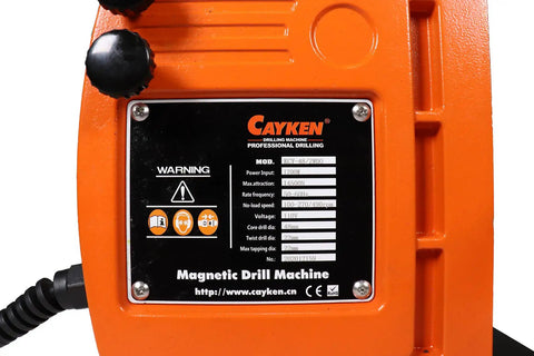 Cayken magnetic drill machine control panel featuring specifications, 1700 watt power, and safety warning labels.