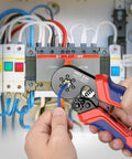 Pro Grade Ferrule Crimping Tool Kit With 1500 Ferrules used to crimp wires in an electrical panel, showcasing tool's usage.