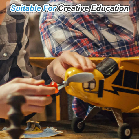 Children assembling RC glider, focusing on propeller installation, highlighting RC Glider Propeller Replacement Prop Blades 6x4 Inch Nylon Folding Propeller.