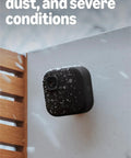 Outdoor 2K Plus Wireless Smart Security Camera with Sharp 2K Video, installed on wall, weather-resistant, snow-covered