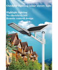 JUDYSSY Solar Street Lights Outdoor mounted on a pole with solar panel, ideal for outdoor lighting in gardens or pathways.