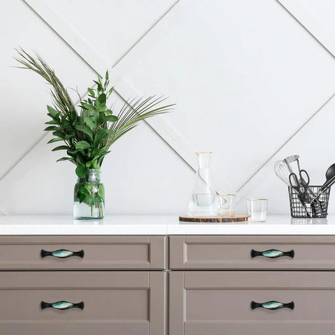 Four Pack Black Arch Cabinet Handles With Slick Marble Finish And Crystal Glass For Kitchen Drawers Bathroom Vanities And Furniture 5.6 Inch pulls on kitchen drawers.