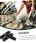 Person loading dishes into a dishwasher with 200 Pack Black Plastic Dishwasher Rack Prong Tip Covers Heavy Duty Replacement Caps installed.