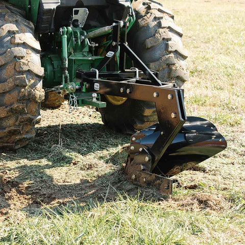 Three Point 21 Inch Double Moldboard Turn Plow For Category 1 Tractors attached to tractor in field