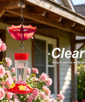 Ant Moat For Hummingbird And Oriole Feeders, 5 Oz Cup, 4 Pack, Clear Water Cup With Red Umbrella Design hanging on porch