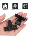 Two black nylon push on fittings in hand, part of Straight Fire Quality Push On Fittings 10 Piece Quick Snap Connectors.