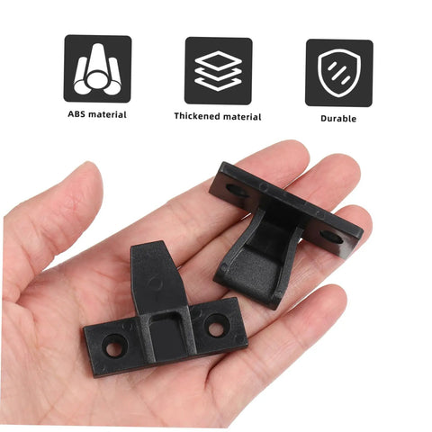 Two black nylon push on fittings in hand, part of Straight Fire Quality Push On Fittings 10 Piece Quick Snap Connectors.