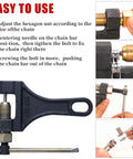 Stylemafia chain breaker tool for #420-530 chains; front view, black metal tool with adjustable bolt and push pin