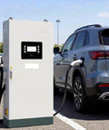 Outdoor Industrial Grade Level 3 Dual EV Charger CCS1 120kW Fast DC Beast With 250A Output charging SUV in parking lot