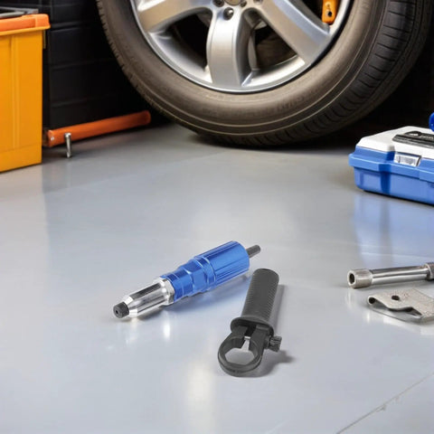 Ergo Rivet Drill Attachment For Cordless Power Drill Kit With Aluminum Alloy Build, Precise Grip Control And Comfortable Handle For Fast Workshop Projects And Machinery Repairs. Blue aluminum alloy rivet drill attachment on garage floor near car wheel