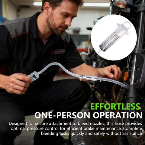 Mechanic using Pro Grade Brake Bleeder Kit for Hydraulic Disc and Clutch Systems 2 Pack with 100ml syringes and 50cm hoses