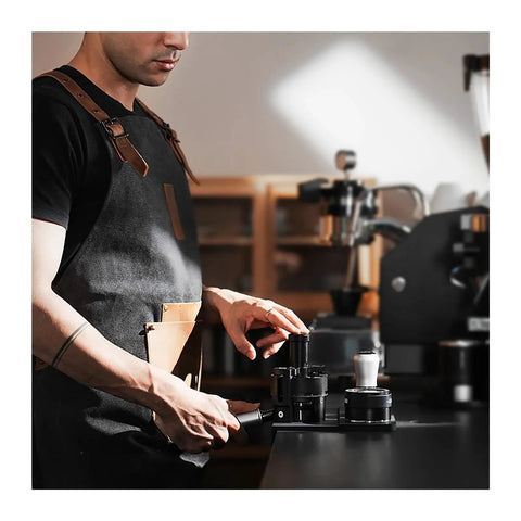 Person using Hit Your Sweet Spot With This Heavy Duty Wdt Needle Distributor for 58mm Espresso Portafilters in cafe.