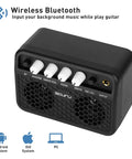 Guitar Mini Amp 5W Rechargeable Bluetooth Amplifier For Desktop Practice With Clean And Distortion Channels Headphone Jack USB C Charging Long Battery Life on a surface showing control knobs and input options.
