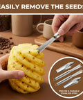 Hand using Heavy Duty Stainless Steel Pineapple Eye Remover Tool Set with Eye Clip and V Shape Cutter Knife on a pineapple
