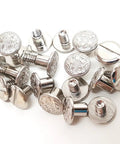 Heavy Duty Quarter Inch Chicago Screws 10 Pack Nickel Plated Floral Engraved Turnbuckle Fasteners, close-up of screws for leather gear.