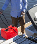 Man holding Portable Boat Gas Tank 3 Gallon 12L With Transfer Hose And Gauge For Outboard Engine Yacht And Fishing Boat