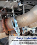Must Have Universal 2.5 Inch Exhaust Clamp With Hanger Kit installed on car exhaust pipe, showcasing mounting hardware and pliers.