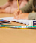 Close-up of pencils on a desk with Mars Plastic Vinyl Erasers 4 Pack White Erasers For Clean And Precise Erasing Latex Free