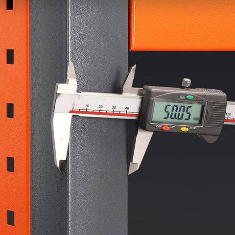Close-up of a digital caliper measuring a heavy duty steel frame, showcasing Heavy Duty Workbench And Rolling Tool Cart With Double Locking Drawers Tough Industrial Shop Beast For Garage Builds And Pain Free Gear Organization Solutions.