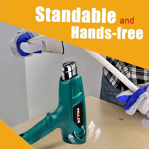 Dual Temp Heat Gun Kit With 752F To 1112F Hot Air Beast For Crafts 4 Nozzles Shrink Wrap Tubing Paint Removal Lightweight Safe With Stand And Overheat Protection being used on a workbench with gloves and tools nearby.