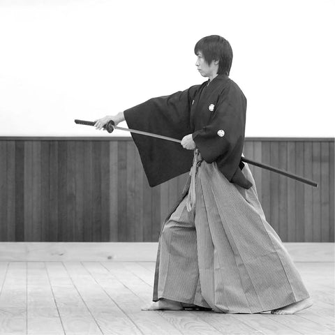 Samurai in traditional clothing practicing with katana, close view of Adjustable Katana Sword Belt Holder With Dual Buckles Dope PU Leather Samurai